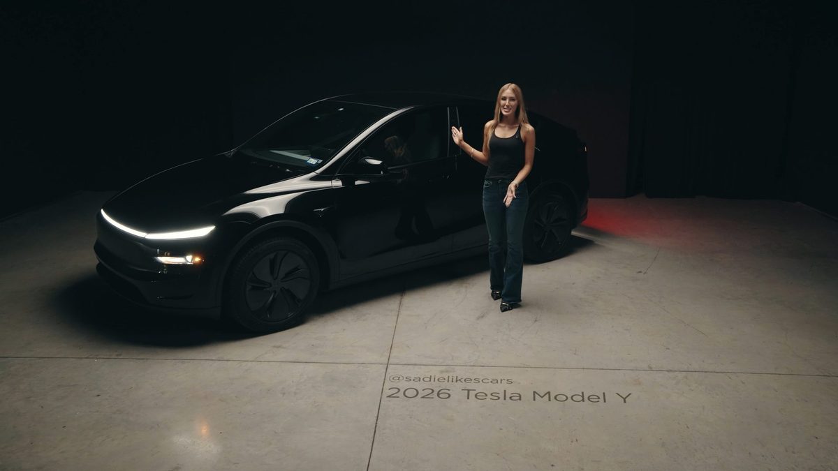 The 2026 Tesla Model Y in the studio, headlights on